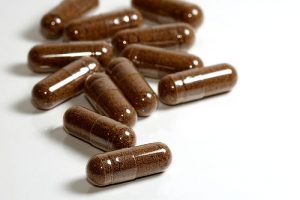 Dark brown Cordyceps capsules as gaming nootropics