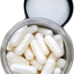 Nootropics.com Aniracetam Bottle open showing the lid and capsules inside