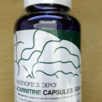 Nootropics Depot ALCAR Capsule Bottle showing the plastic seal